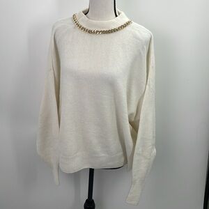 H&M cream sweater with gold color chain at neck medium